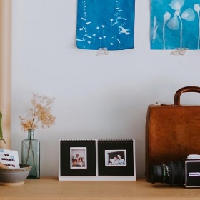 The essence of exceptional living a table with a plant and a lamp and a potted plant